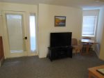 TV and Front Entrance of Waterville Valley Vacation Rental 